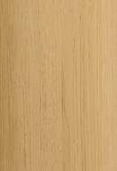 Close-up of a wooden surface with a light brown color and visible grain pattern.