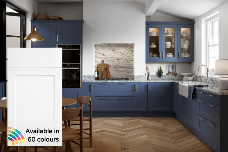 Modern kitchen with blue cabinets and wooden flooring
