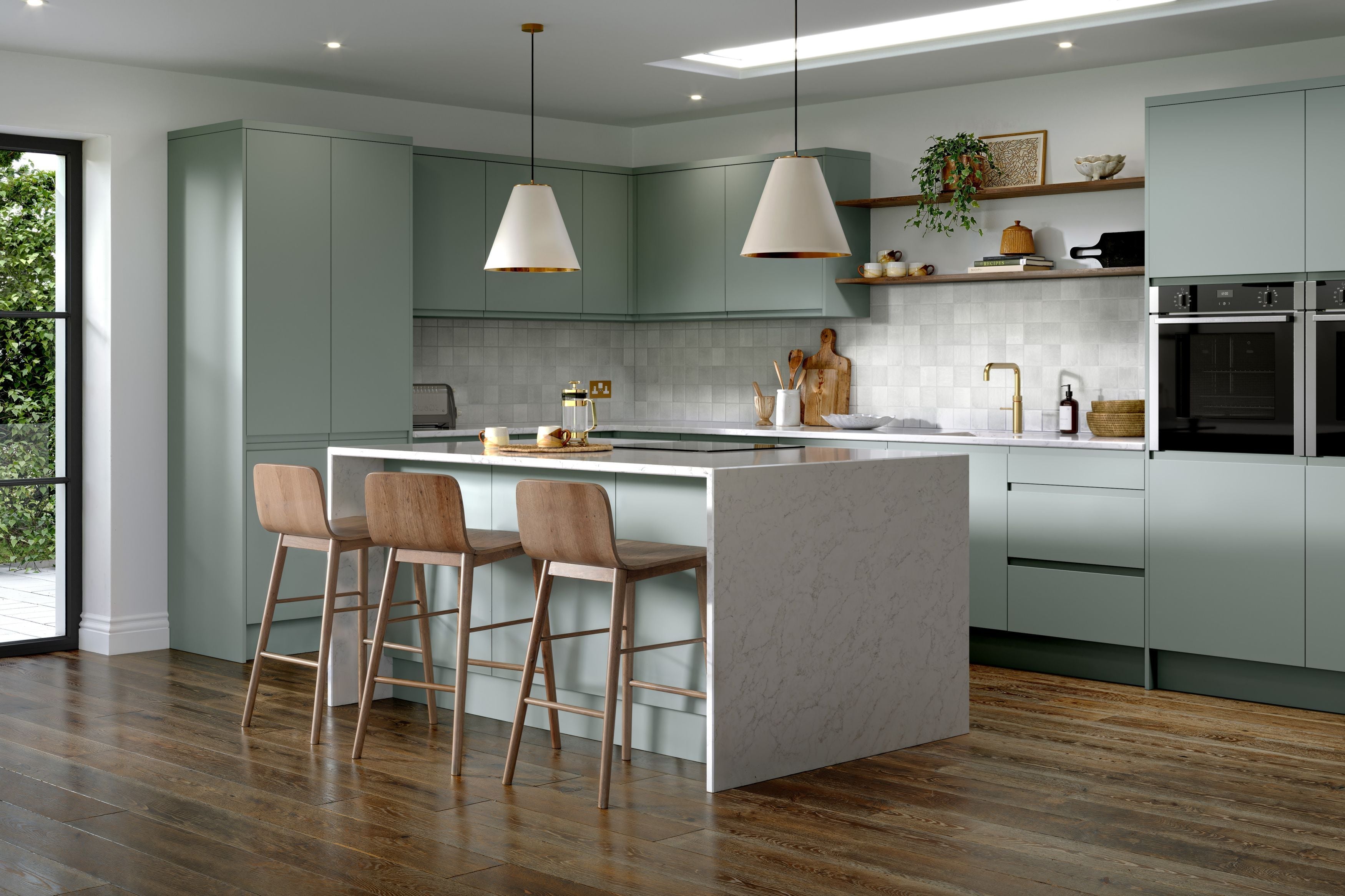A modern handleless kitchen fitted with Jayline Supermatt Sage Green doors.