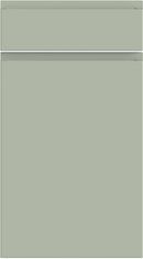 A single matte sage green cabinet door with a horizontal handle groove.