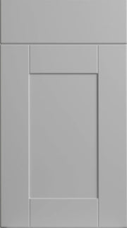 A matte dove grey classic shaker style cabinet door with a square panel design.