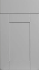 A matte dove grey classic shaker style cabinet door with a square panel design.