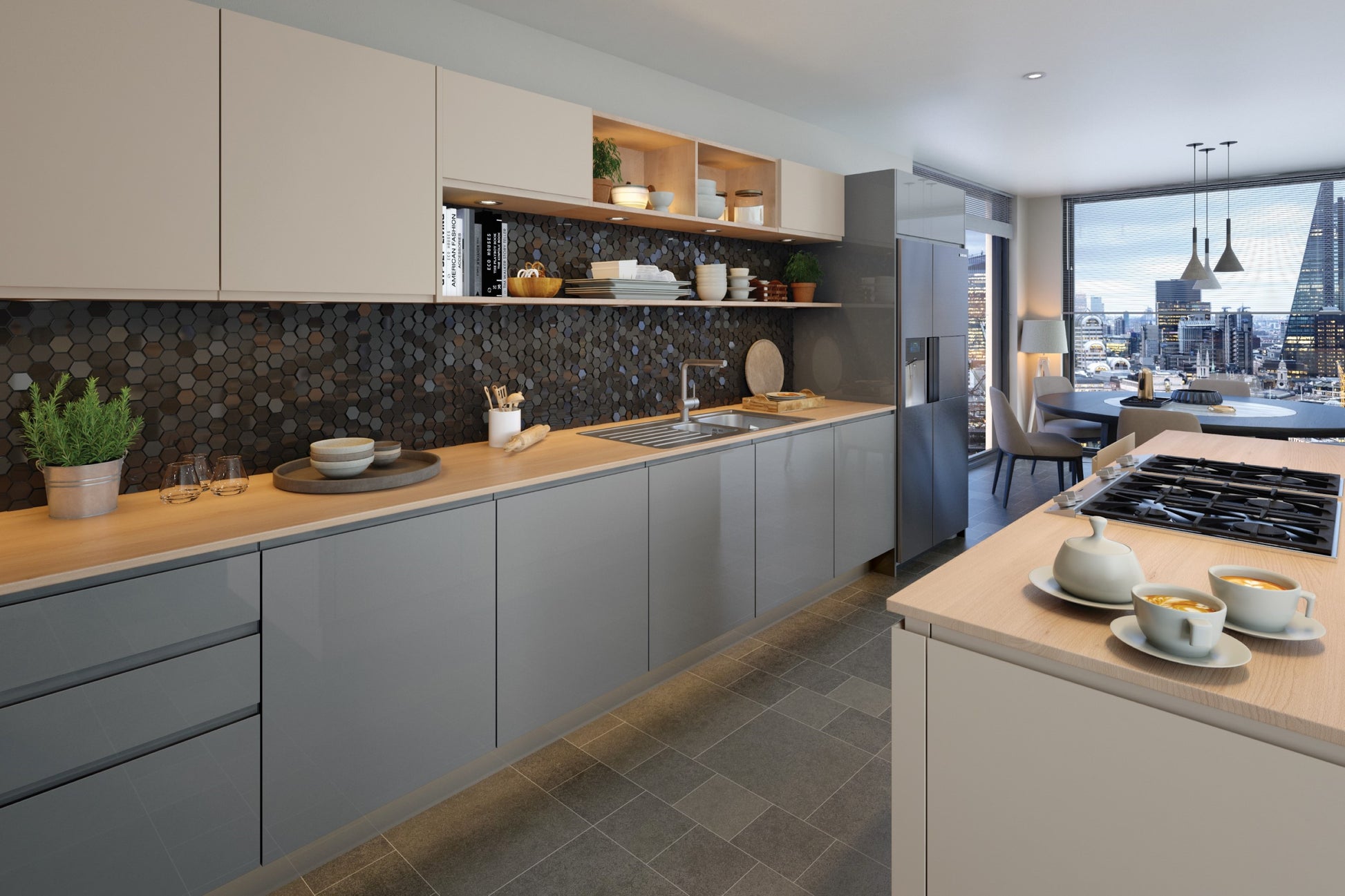 A sleek handleless J-Pull kitchen in a Supergloss Dust Grey finish.