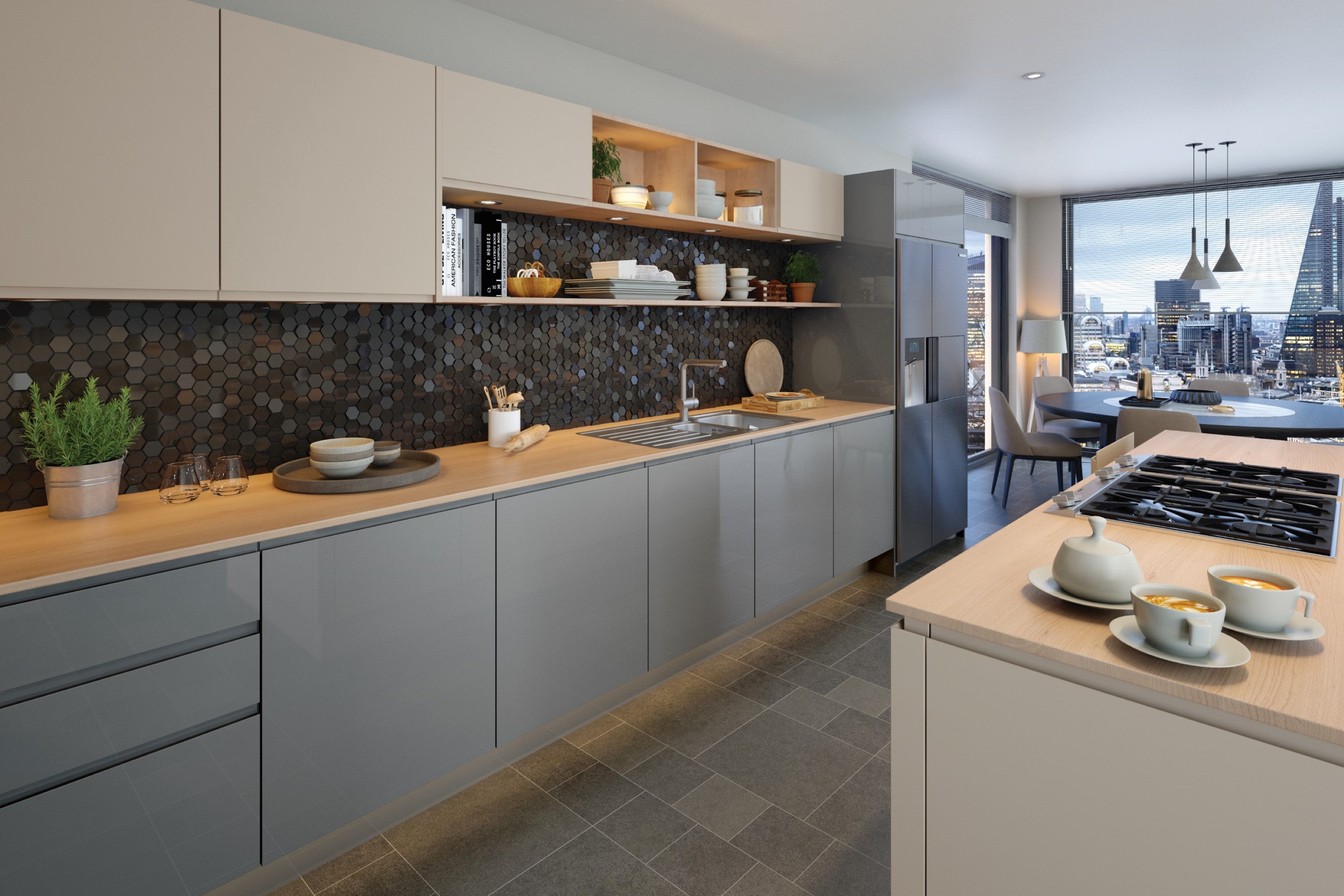 A sleek handleless J-Pull kitchen in a Supergloss Dust Grey finish.